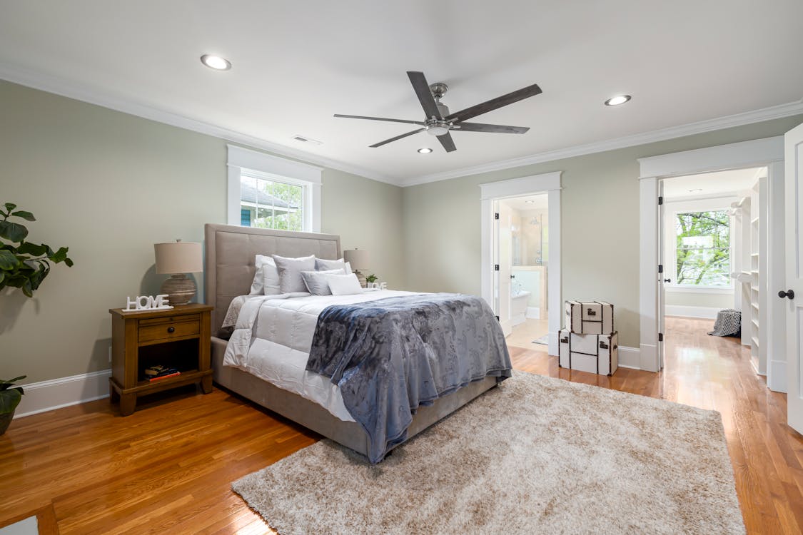 Ceiling Fan above a Bed