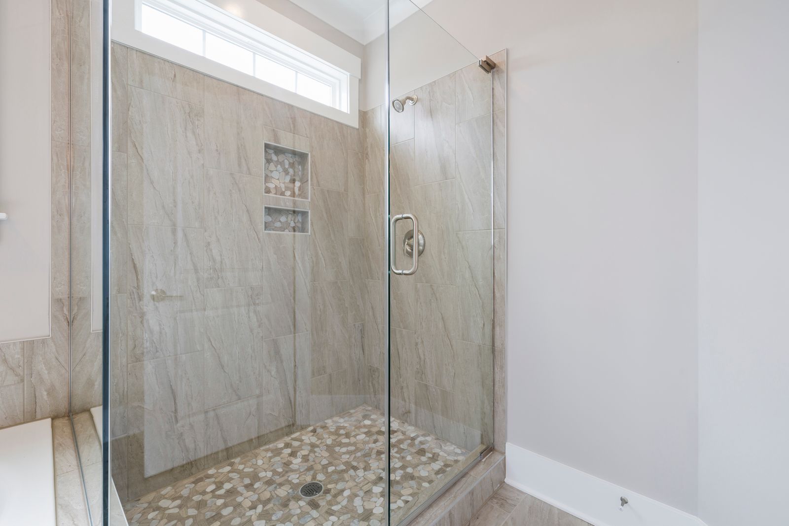 Premium modern bathroom with shower and marble finishes