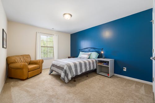 Bedroom with Blue Wall