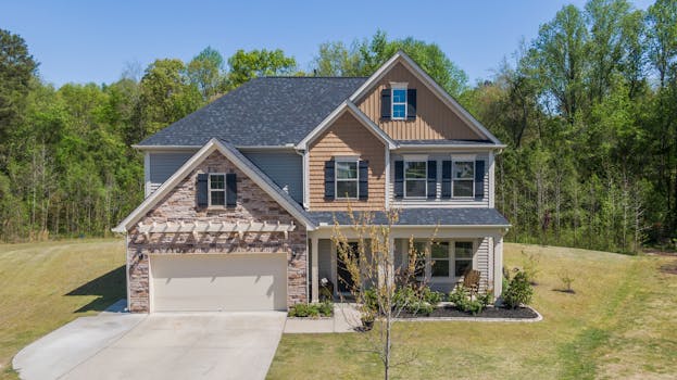 Aerial view of a modern two-story suburban house in Fuquay-Varina, North Carolina.