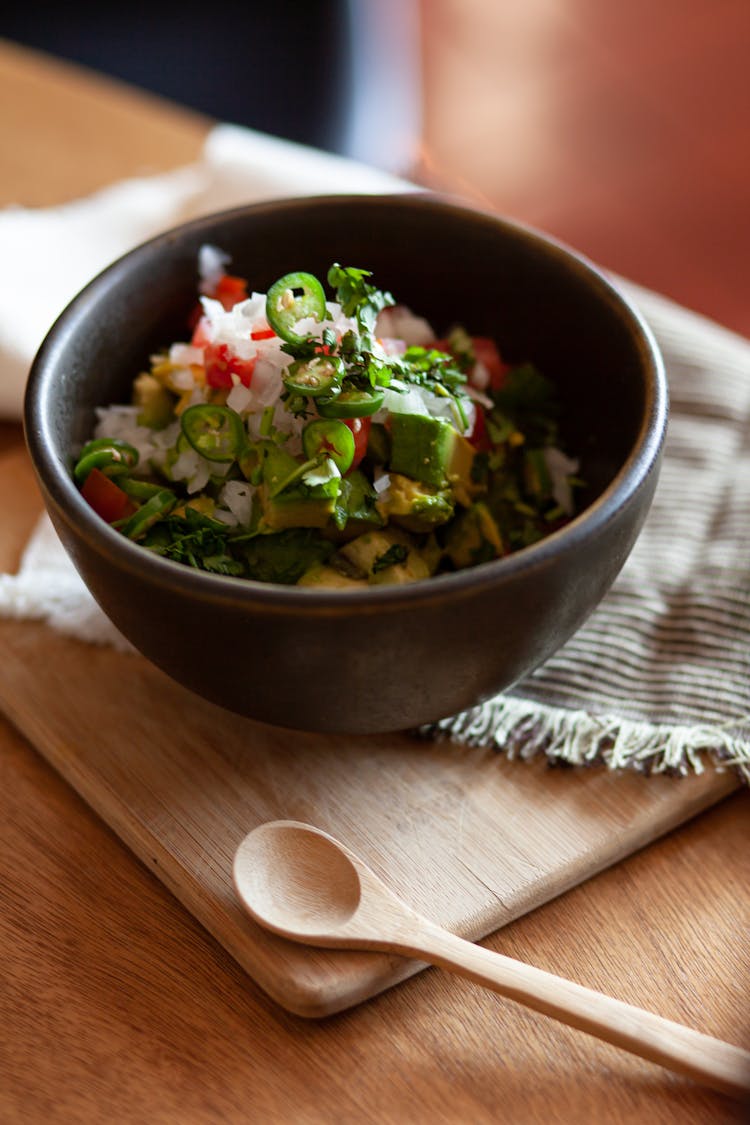 Guacamole On Black Ceramic Bowl