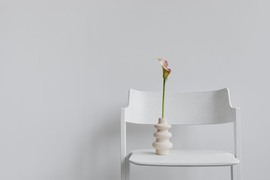 Tall sculptural vase in deep red glaze