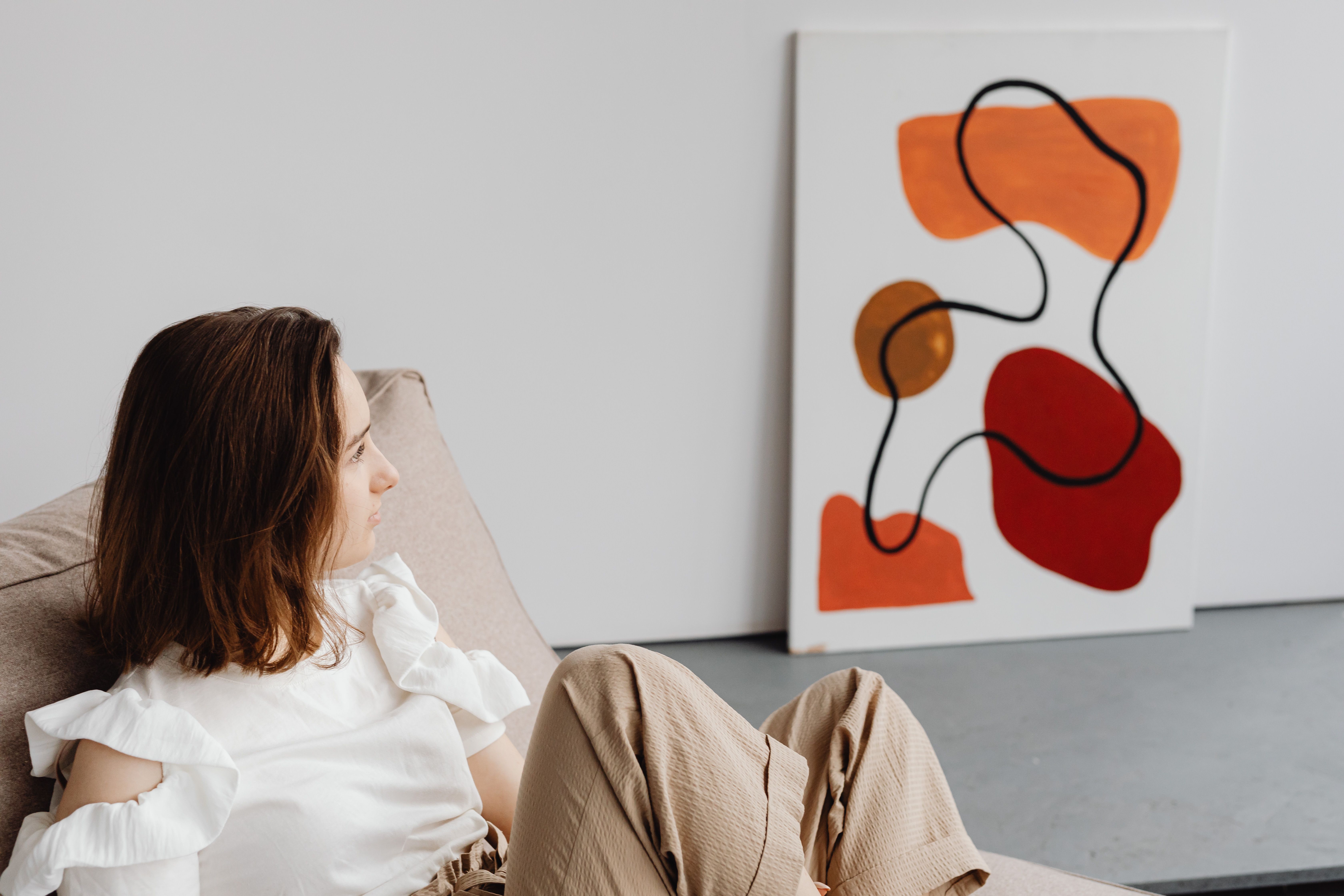 A large canvas changes a room more than a small one, and asks for more wall than people expect