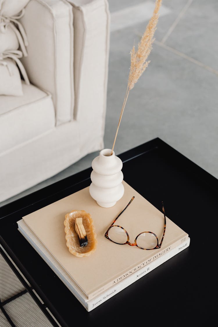 Books And Decorative Ornaments On A Center Table