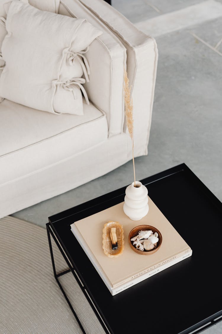 Books And Decorative Ornaments On A Center Table