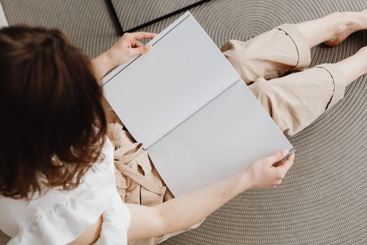 A Woman Sitting with a Book