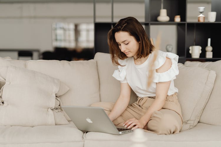 A Woman Working While At Home