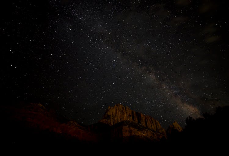 Stars Above A Mountain At Night