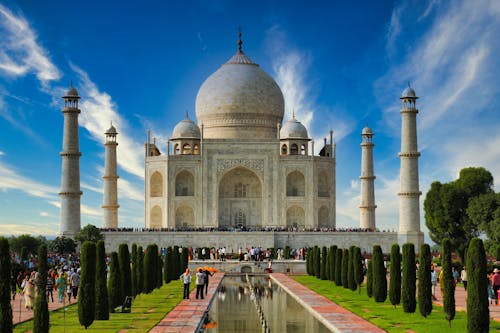 Amazing Taj Mahal Mausoleum under Blue Sky 