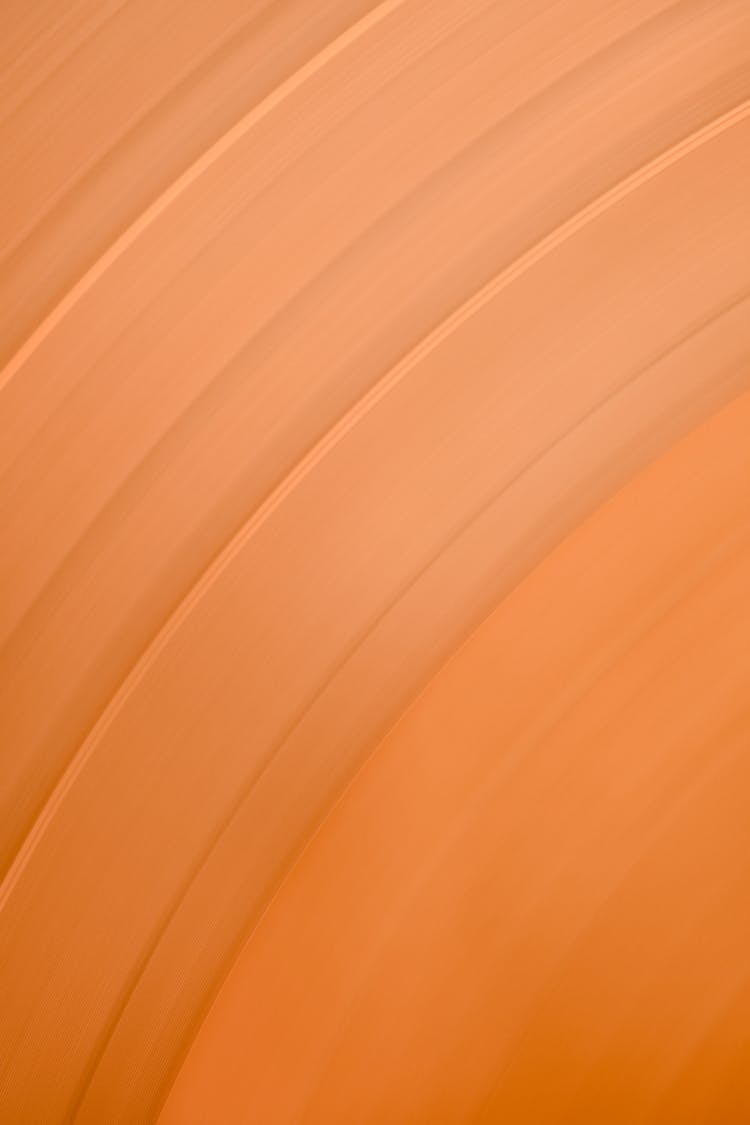 Curved Lines On Orange Surface