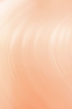 Smooth abstract design featuring a flowing cream gradient texture, perfect for modern backgrounds.
