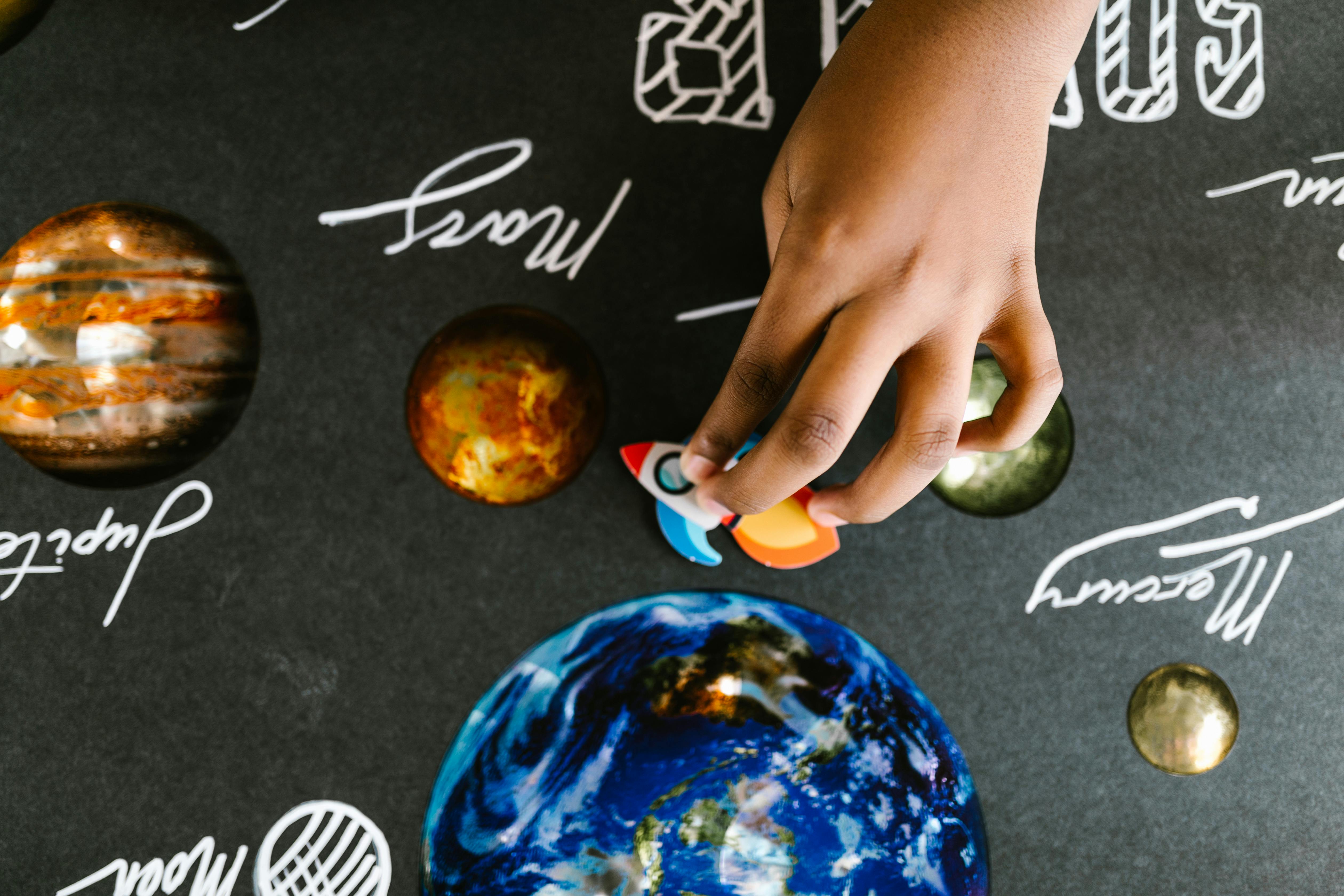 handmade planets on a board