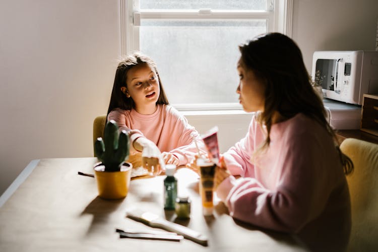 Mother And Daughter Having A Conversation