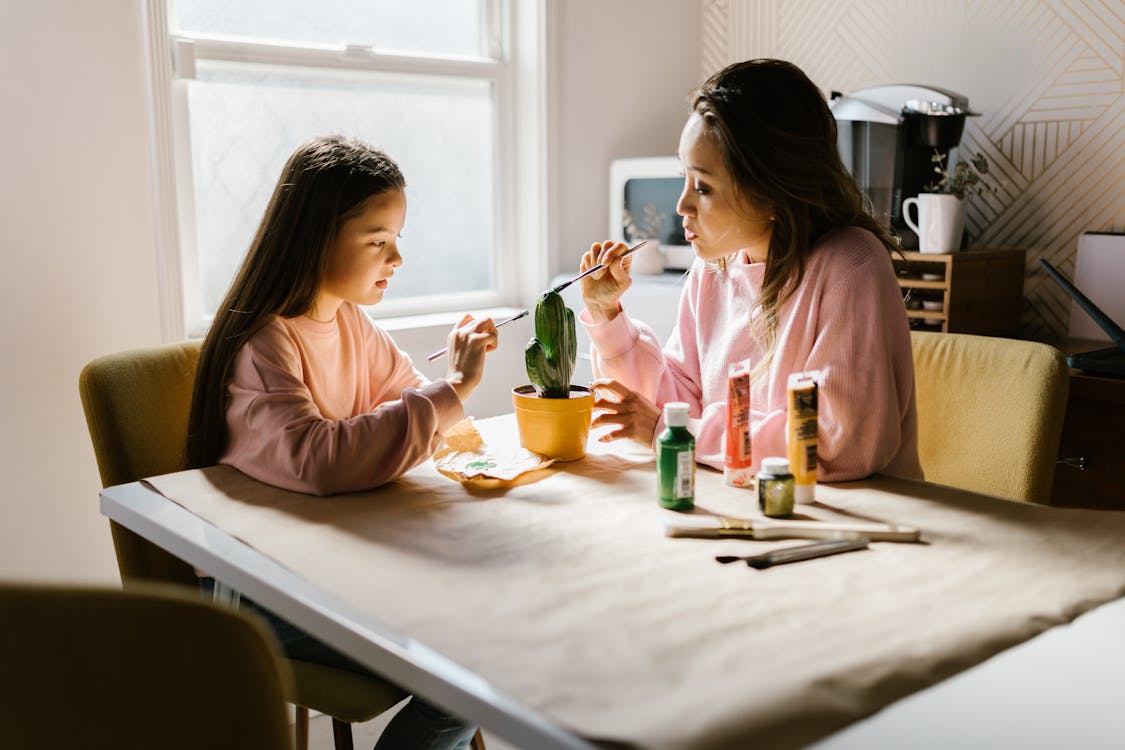 Free Mother and Daughter Painting Stock Photo