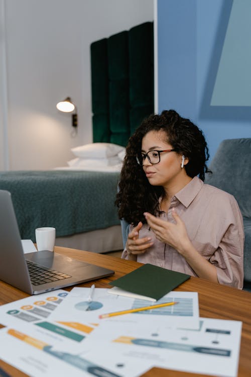 Free Professional Woman having a Video Conference  Stock Photo