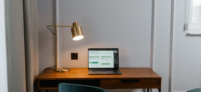 Customer home studio with oak desk and lamp