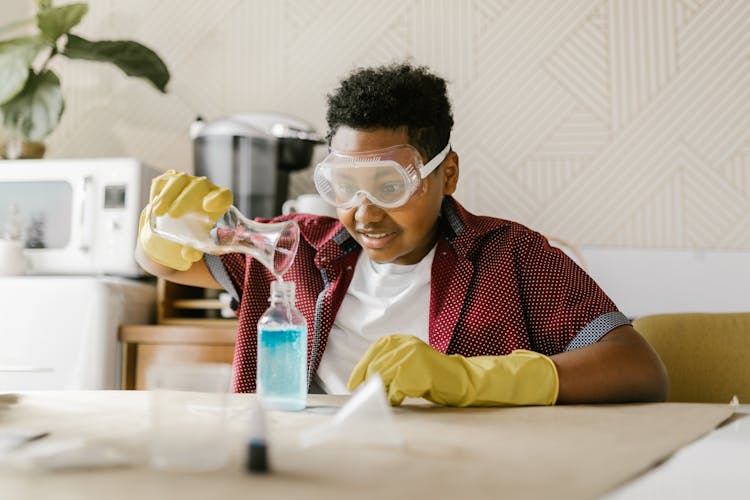 A Boy Doing A Home Experiment