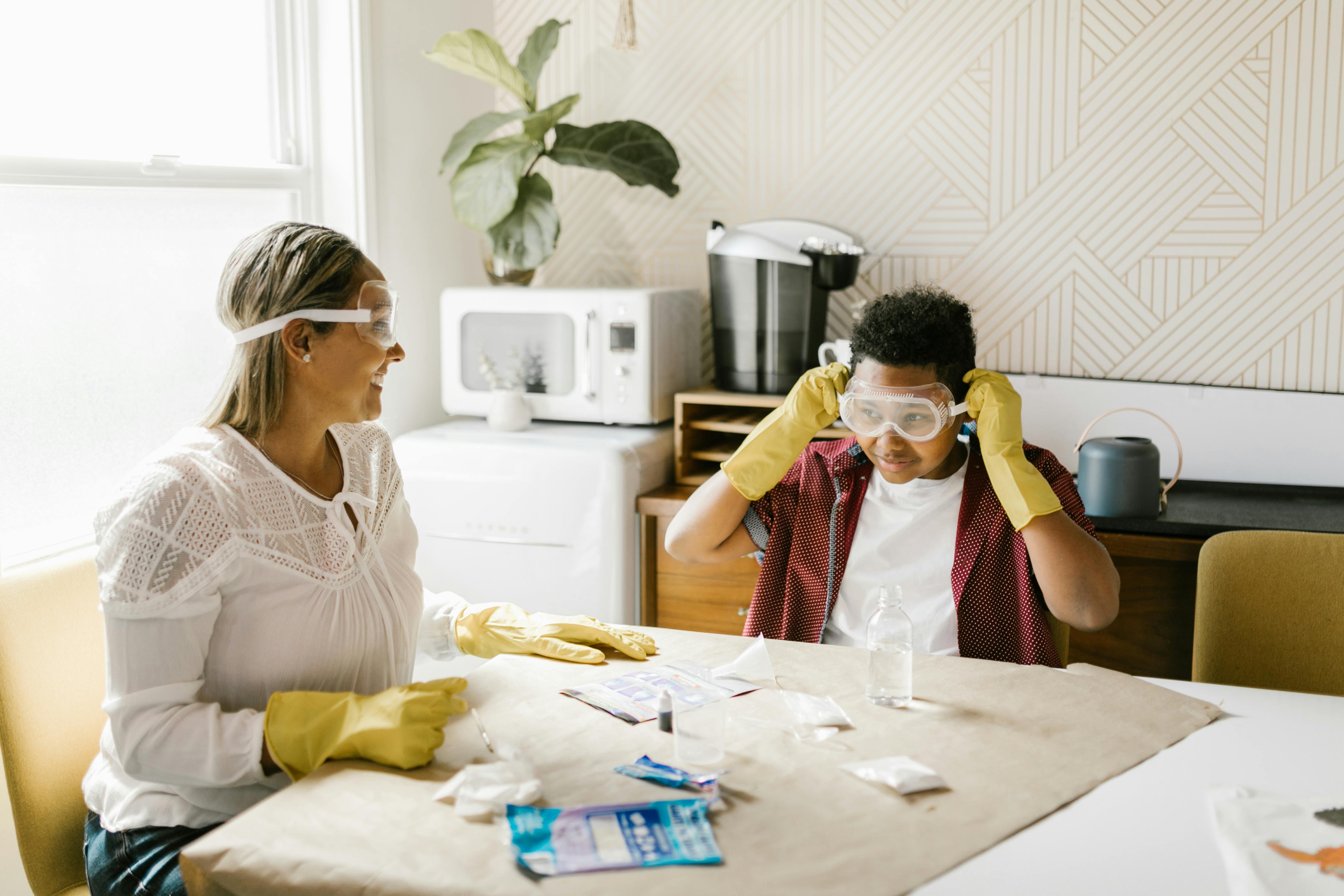 girl painting school kitchen