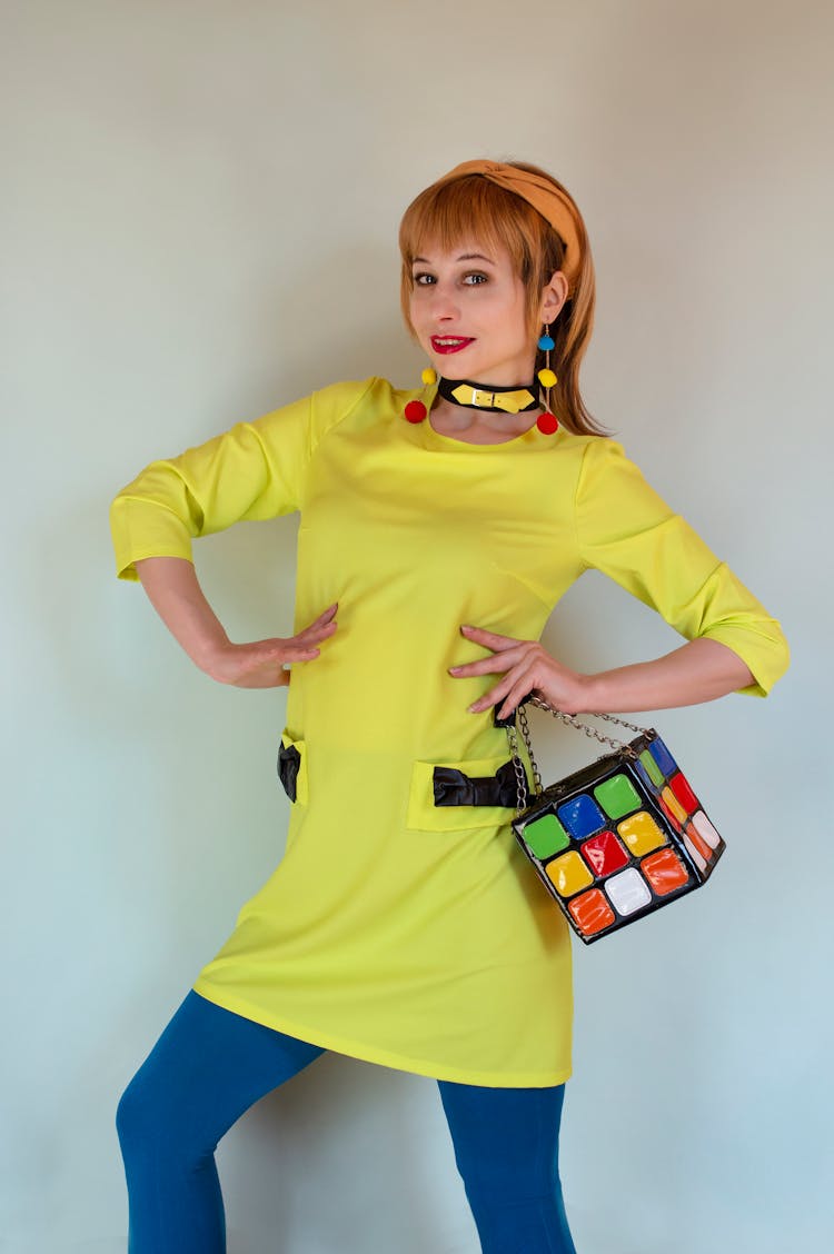 Stylish Woman With Colorful Puzzle Cube Bag