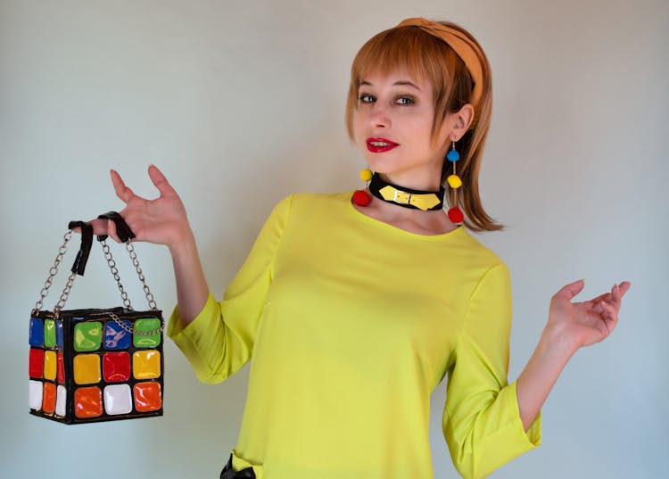 Stylish Woman With Multicolored Handbag