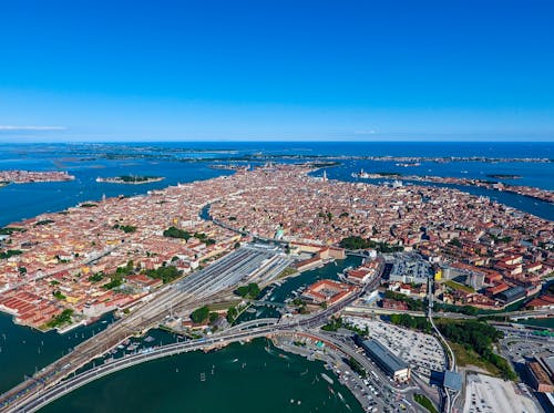 Aerial View of a City on a Body of Water