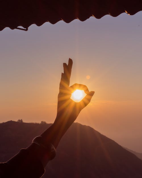 Free Photography of Hand During Sunset Stock Photo