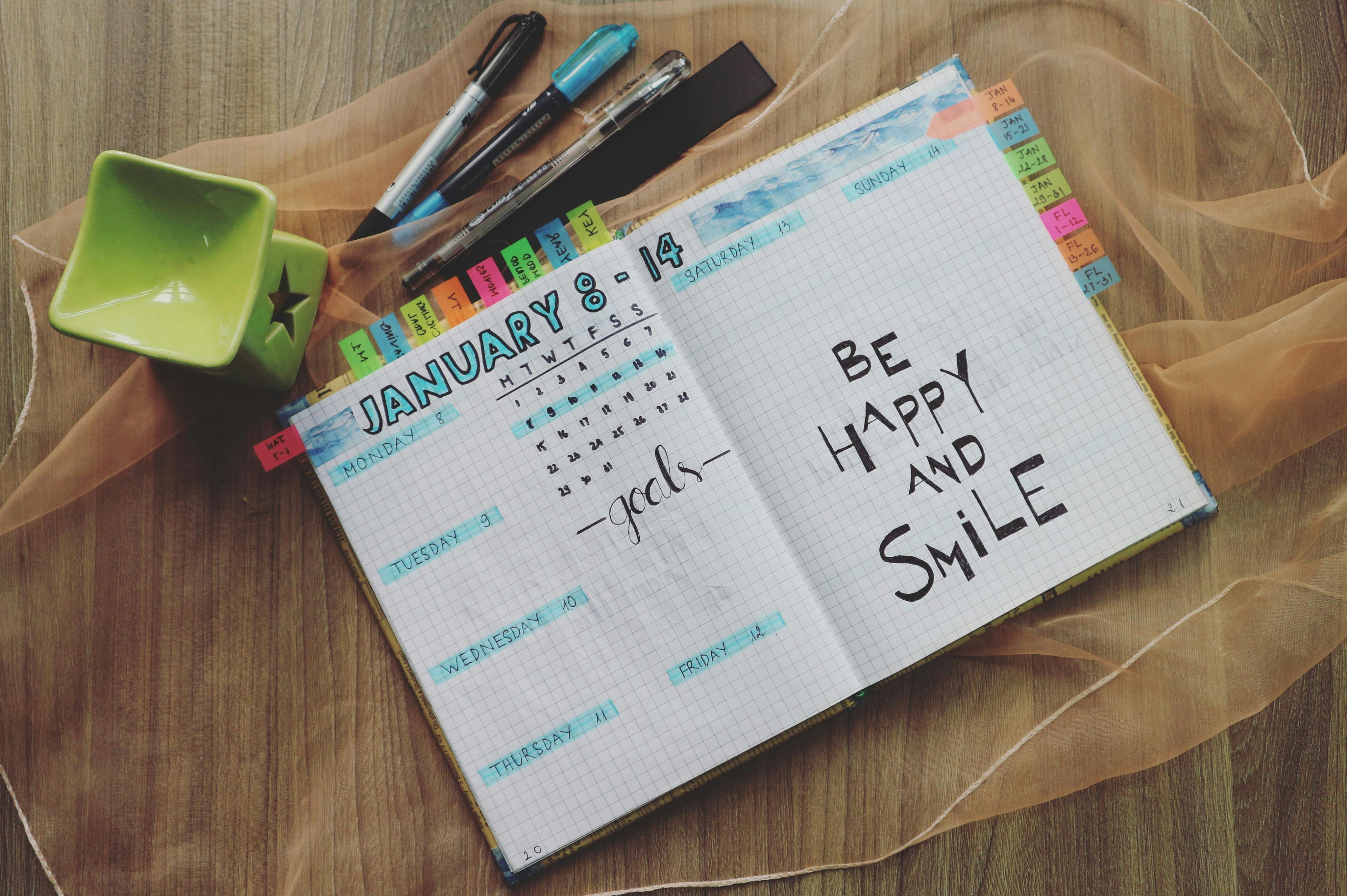 Inspirational Quotes Written On A Planner · Free Stock Photo