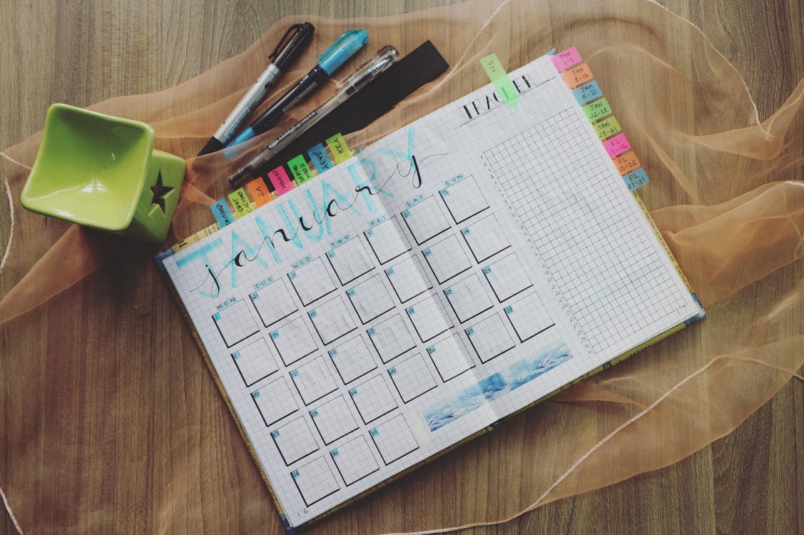 Free Photo of Planner and Writing Materials like an online secretary might use