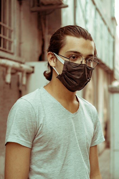 A Man Posing in a Face Mask