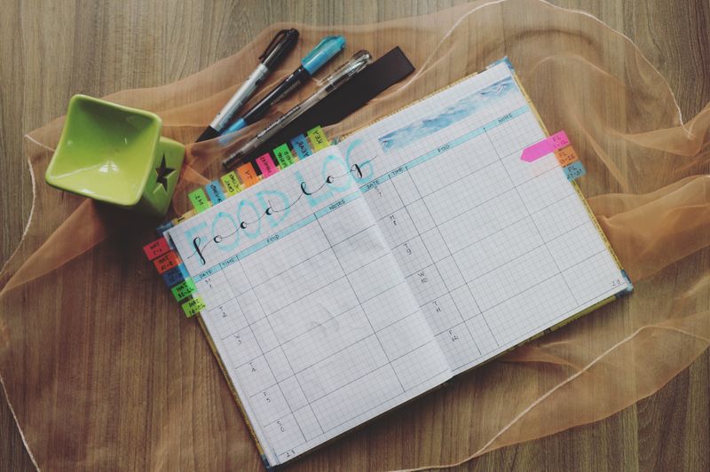 digital planner with colorful side tabs for each section