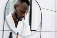 Man in White Button Up Shirt Holding Black Pen