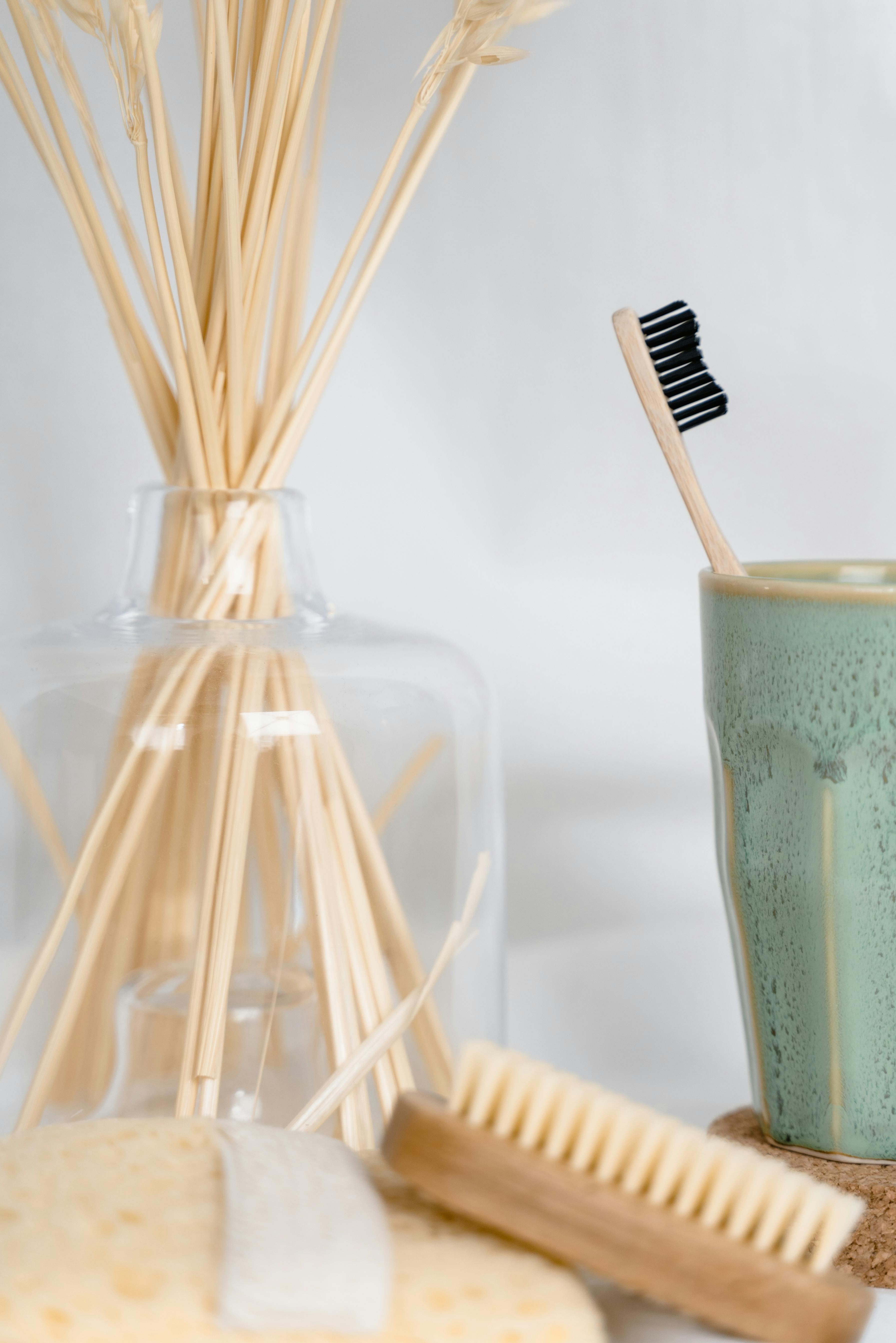 white sticks in clear glass jar