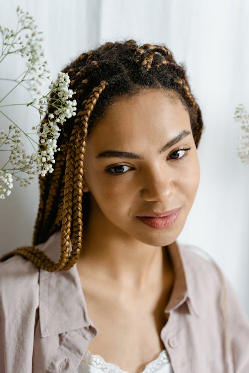 Close-Up Photo of Woman with Braided Hair