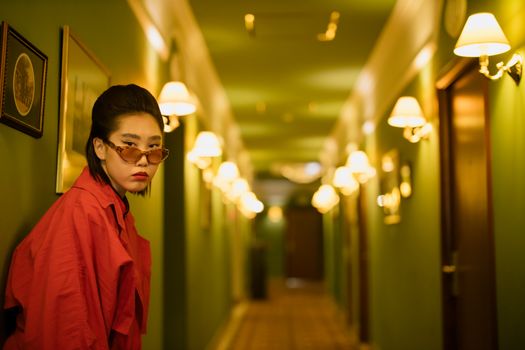 Woman in Red Dress Wearing Brown Framed Sunglasses
