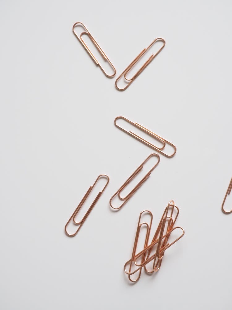 Paper Clips On White Surface