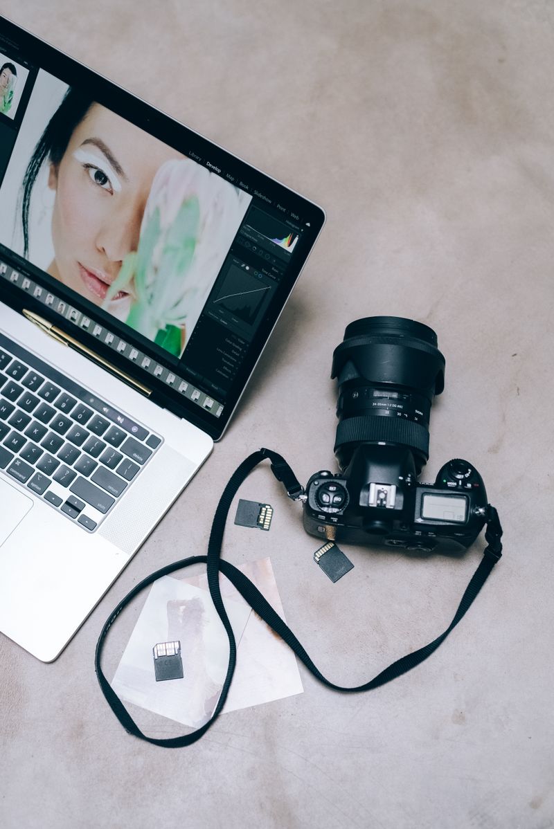 DSLR camera and laptop set up for video editing and color work