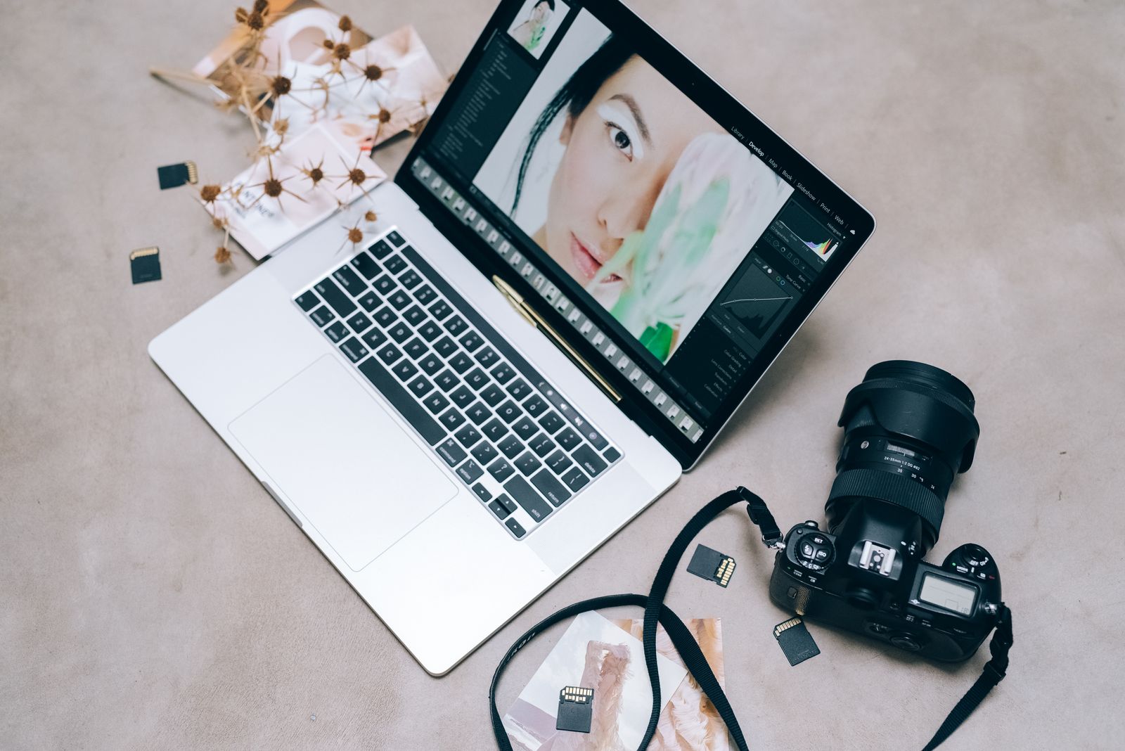 Creative workspace with a laptop and camera for content creation