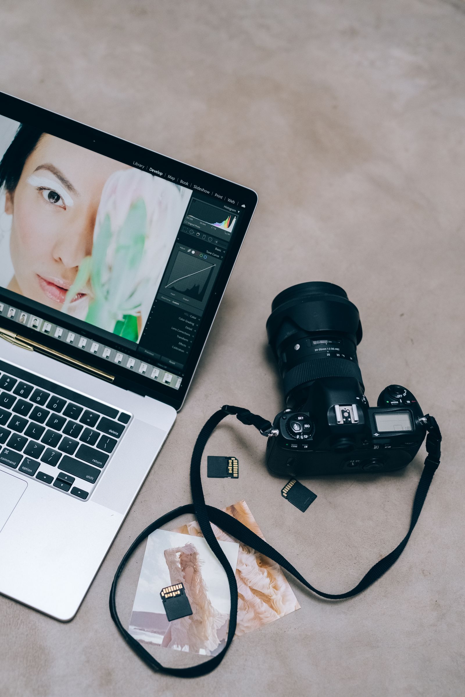 Creative workspace with a laptop and camera for photo and video editing