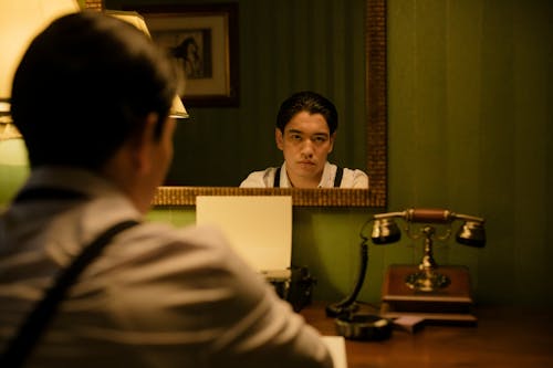 Man in front of the Mirror