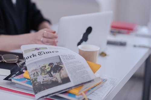 A Newspaper on the Table