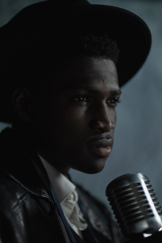 Artist at a vintage microphone — photo by cottonbro studio on Pexels