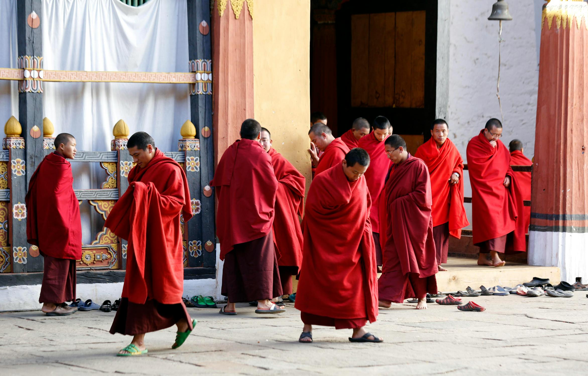 Men wearing red robes in Trongsa, Trongsa, Bhuta