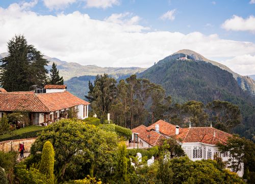 Free Beautiful landscape of Bogotá with Monserrate Mountain and traditional architecture. Stock Photo