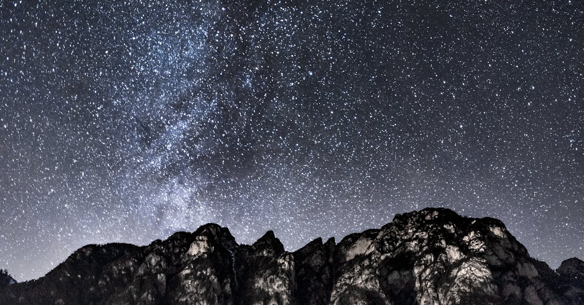 Mountain Under Starry Sky during Nighttime
