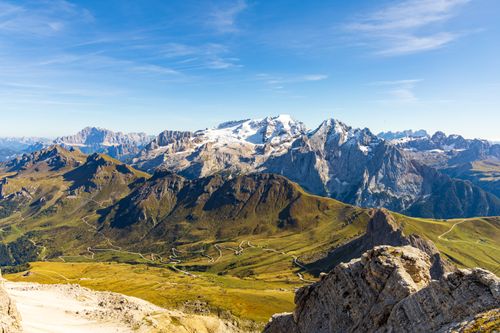 Free Breathtaking view of the snow-capped Dolomites under a clear sky in Veneto, Italy. Stock Photo