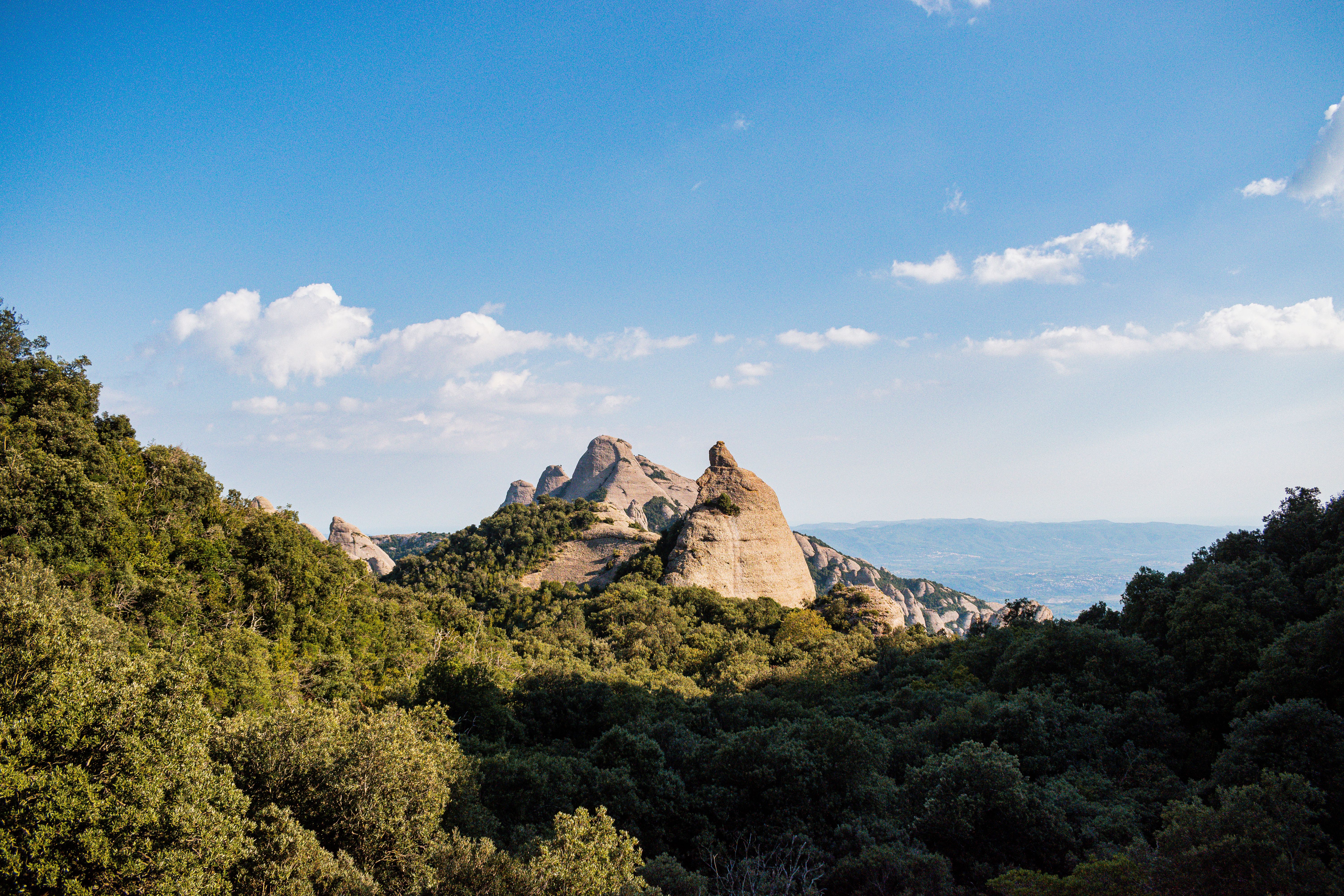 Captivating landscape of Montserrat's rocky peaks under a clear blue sky.