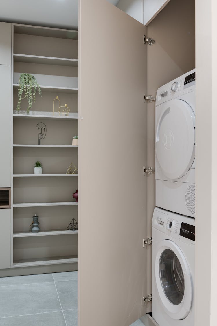 Washing Machine And Dryer In Cabinet