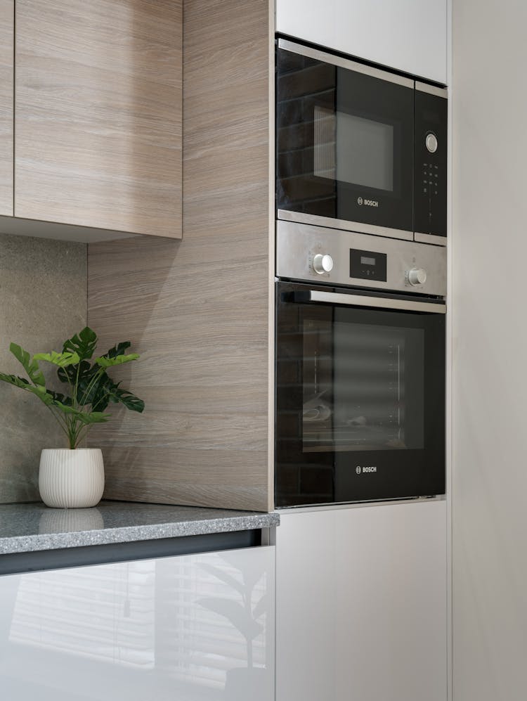 Plant And Microwaves In Kitchen