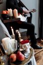 Woman in Black Pants Playing Acoustic Guitar