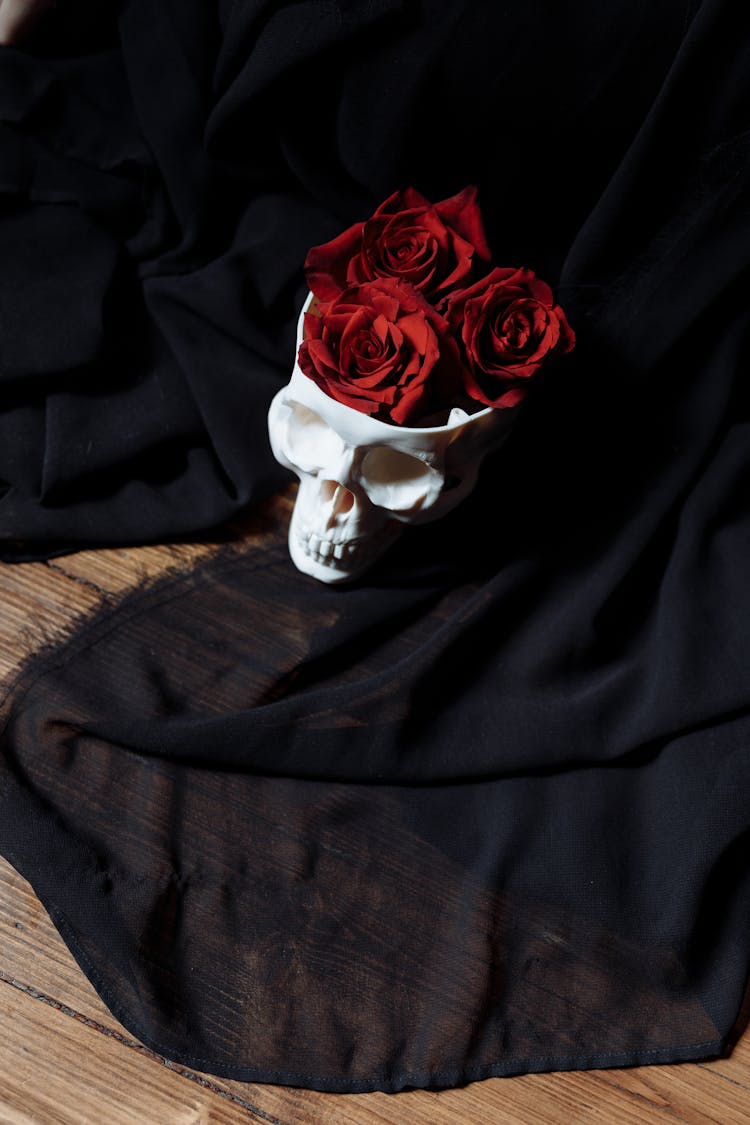 Red Roses In A Skull